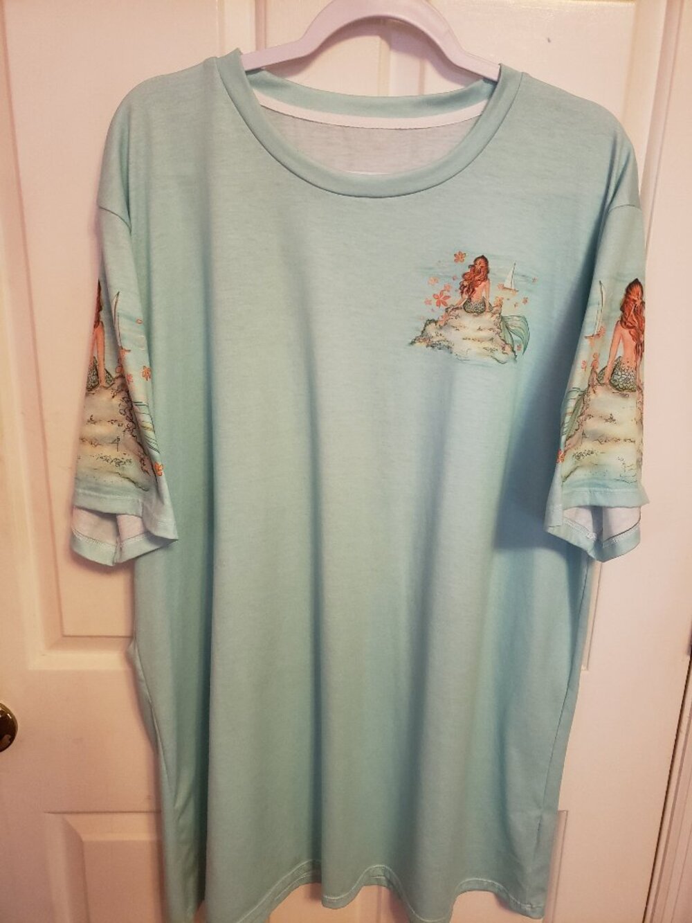 Mermaid tshirt design on front and back.